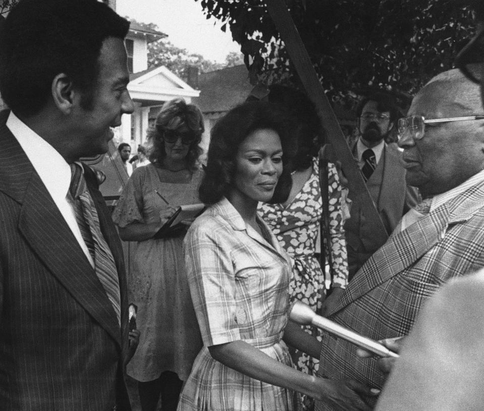 FILE - Ambassador Andrew Young, from left, talks to actress Cicely Tyson and Rev. Martin Luther King, Sr. on the set of "Martin Luther King, Jr." being filmed in Macon in 1977. Tyson, the pioneering Black actress who gained an Oscar nomination for her role as the sharecropper's wife in "Sounder," a Tony Award in 2013 at age 88 and touched TV viewers' hearts in "The Autobiography of Miss Jane Pittman," has died. She was 96. Tyson's death was announced by her family, via her manager Larry Thompson, who did not immediately provide additional details. (AP Photo, File)