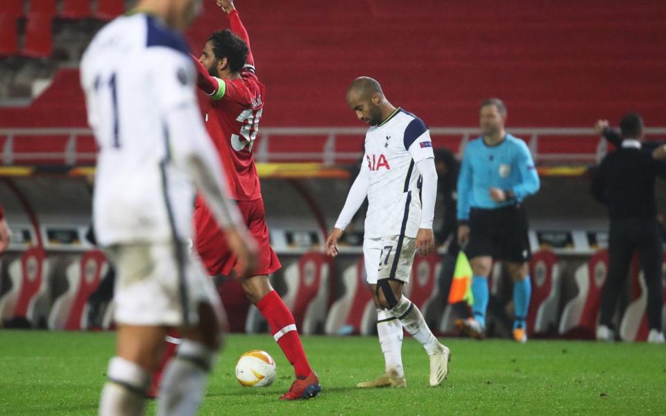 Tottenham Hotspur's Lucas Moura looks dejected after the match - Tottenham unbeaten run ends with lacklustre defeat to organised Antwerp - REUTERS