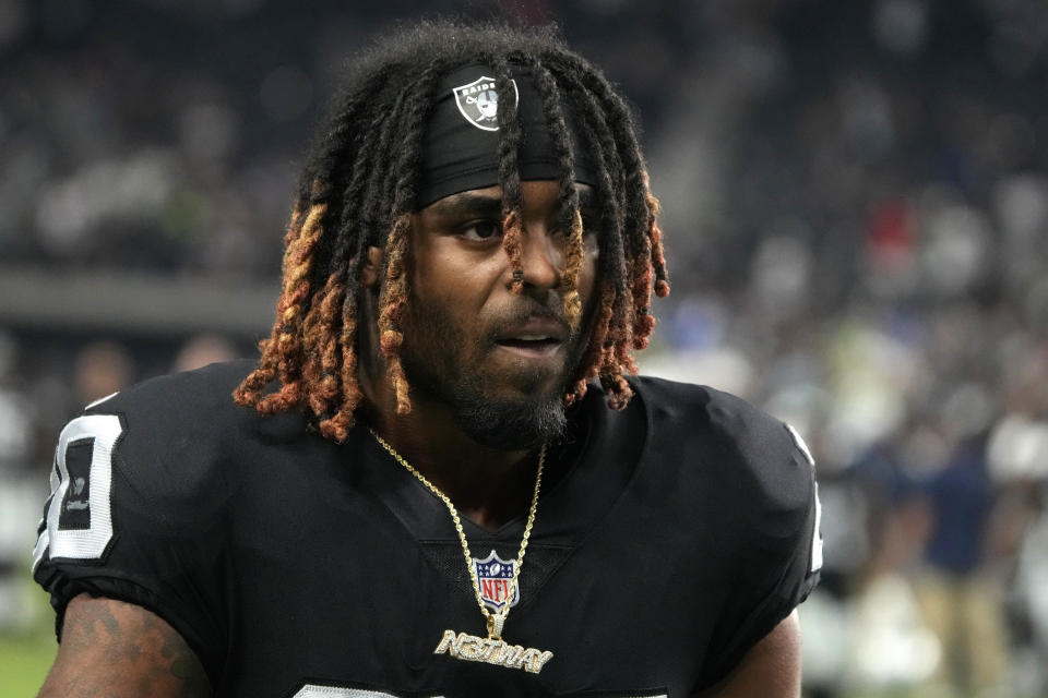 FILE - Las Vegas Raiders cornerback Damon Arnette stands along the sideline during the second half of the team's NFL preseason football game against the Seattle Seahawks on Aug. 14, 2021, in Las Vegas. Arnette, no longer with the team, has been indicted in Nevada on felony charges stemming from allegations that he brandished a handgun during an argument with Las Vegas Strip casino valets in January 2022. (AP Photo/Rick Scuteri,File)