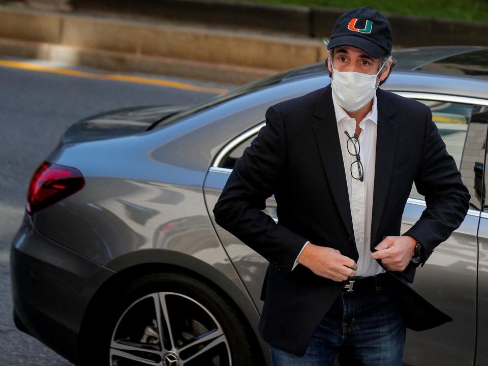 Michael Cohen arriving back at his home after being released early from prison: (Reuters)