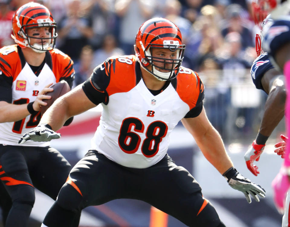 FILE - In this Oct. 16, 2016, file photo, Cincinnati Bengals guard Kevin Zeitler blocks during an NFL football game against the New England Patriots at Gillette Stadium in Foxborough, Mass. The Browns are building a wall for their franchise quarterback. Cleveland will sign free agent right guard Kevin Zeitler when the free agency signing period opens Thursday, March 9, 2017, a person familiar with the negotiations told the Associated Press. Zeitler’s signing will follow the team giving left guard Joel Bitonio a five-year extension, said the person who spoke on condition of anonymity because nothing can be announced until the new NFL league season begins at 4 p.m. (AP Photo/Winslow Townson, File)