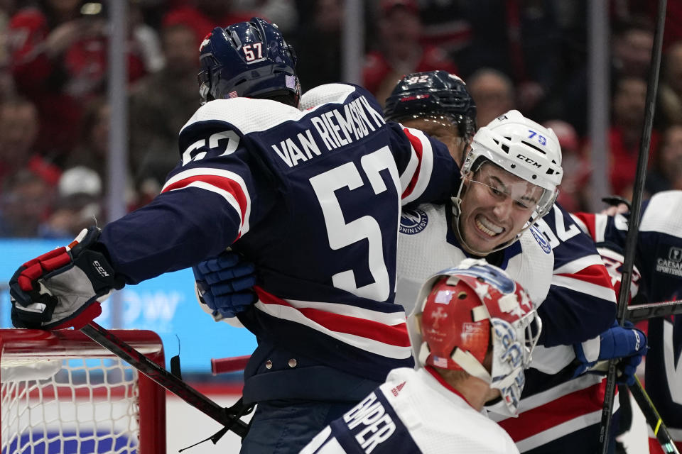 Tampa Bay Lightning center Ross Colton, right, fights with Washington Capitals defenseman Trevor van Riemsdyk in the second period of an NHL hockey game, Friday, Nov. 11, 2022, in Washington. (AP Photo/Patrick Semansky)