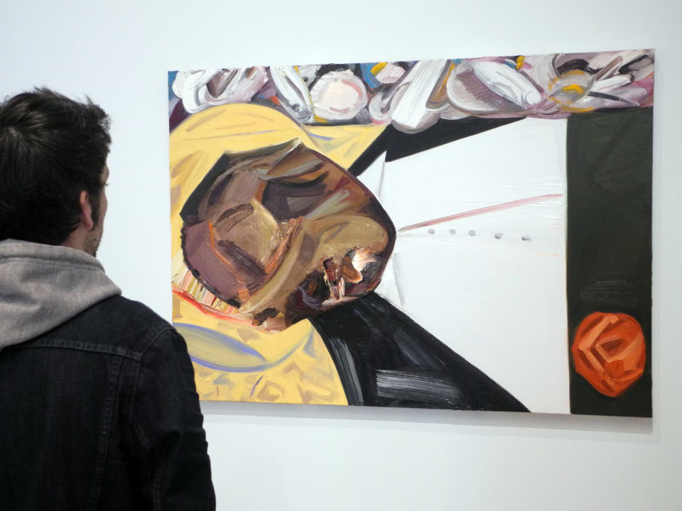 A visitor looks at the painting 'Open Casket' by artist Dana Schutz in the Whitney Museum of American Art in New York, USA, 29 March 2017. The artwork inspired by a photo of the Afro-American Emmett Till who was murdered in Mississippi in 1955 has caused controversy in the world of art. Photo: Johannes Schmitt-Tegge/dpa | usage worldwide   (Photo by Johannes Schmitt-Tegge/picture alliance via Getty Images)