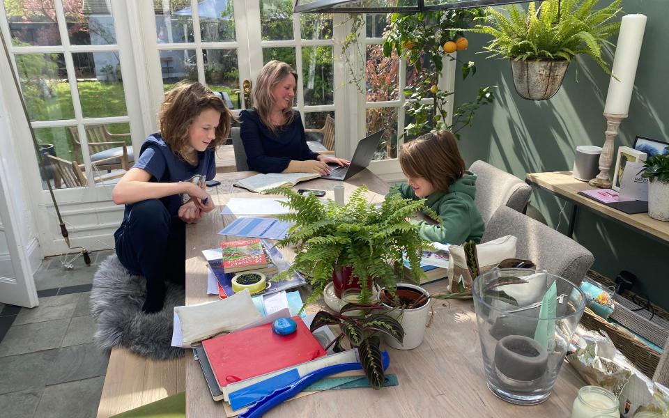 working from home with her sons, Max and Fred