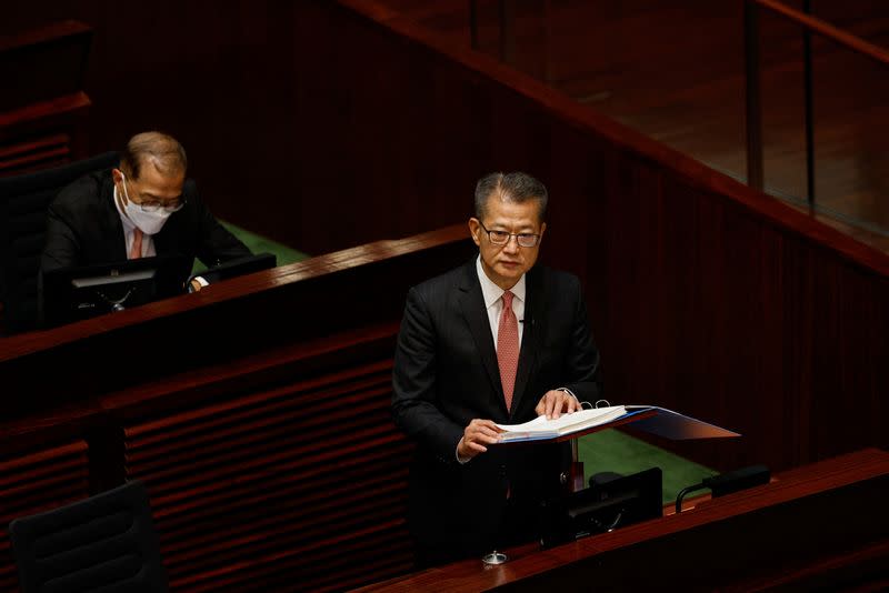 Hong Kong's Finance Secretary Paul Chan delivers the annual budget address at the Legislative Council in Hong Kong