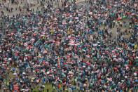 Belarusian opposition supporters hold a rally in Minsk