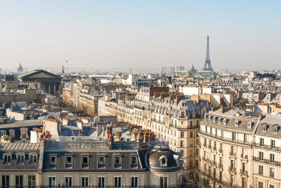 Paris skyline with Eiffel tower aerial view in daylight, France