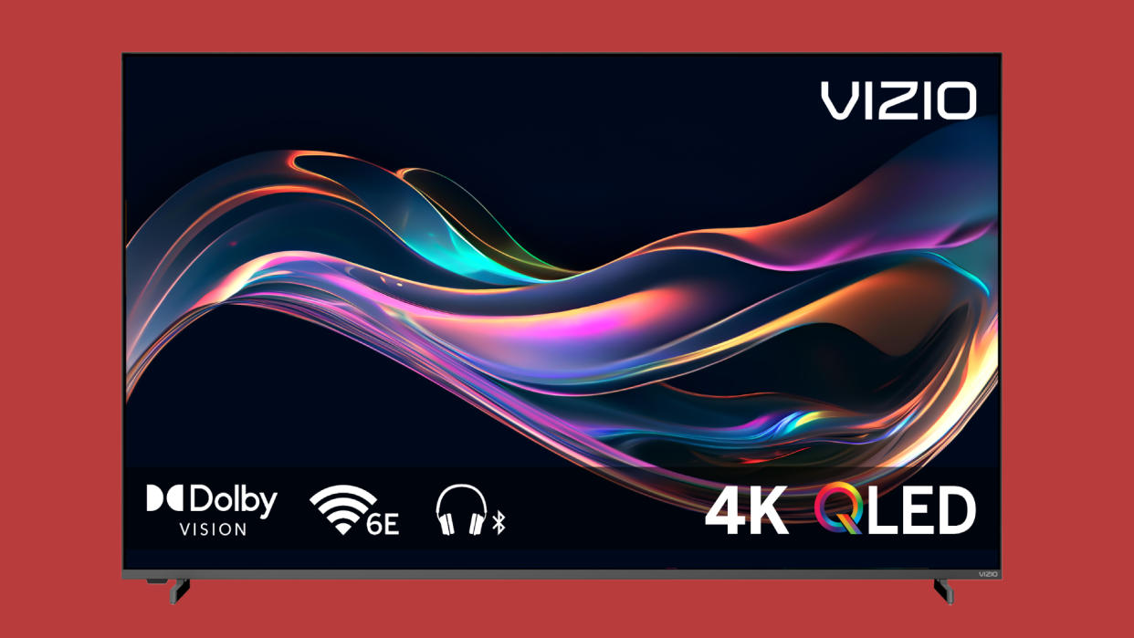  Vizio Quantum Pro TV on red background. 