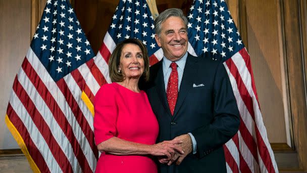 PHOTO: In this Jan. 3, 2019, file photo, House Speaker Nancy Pelosi stands with her husband, Paul Pelosi, during the ceremonial swearing-in of the 116th Congress in the Rayburn Room of the U.S. Capitol in Washington, D.C. (Doug Mills/The New York Times via Redux, FILE)