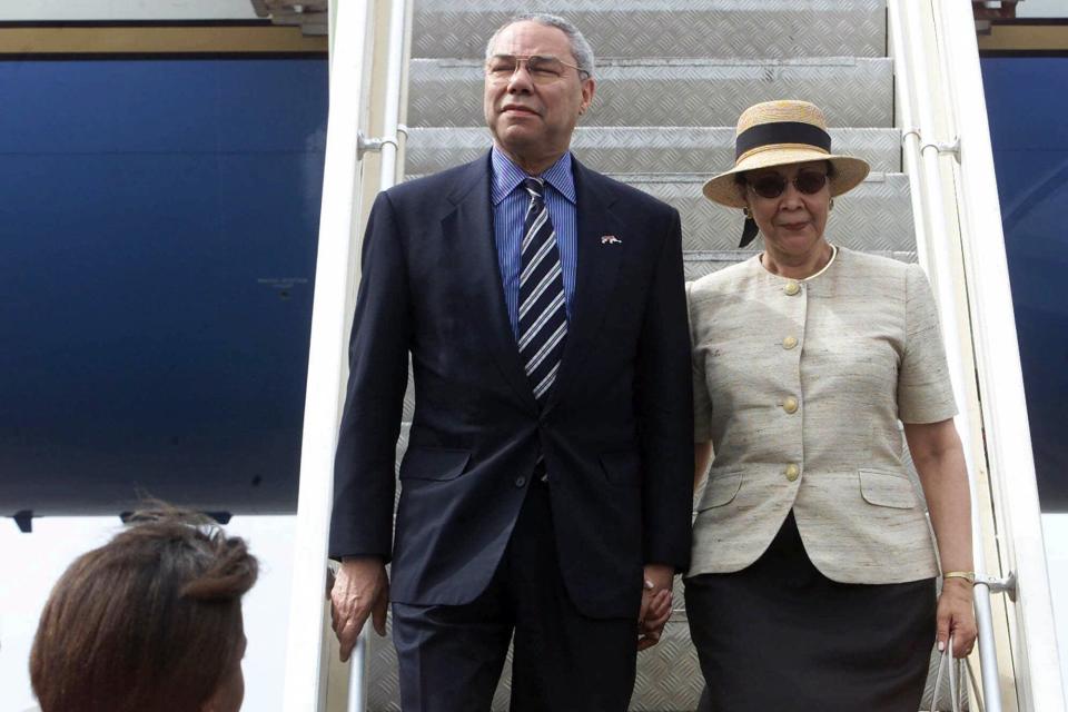 U.S. Secretary of State, Colin Powell and his wife Alma Powell walk down the stairs from the airplane to the tarmac at the airport in Bamako, capital of Mali in West Africa, . Powell arrived in Mali, Wednesday on the first stop of his four country African tour to focus on the AIDS epidemic and democratic and economic reform MALI POWELL AFRICA, BAMAKO, Mali