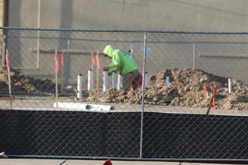 A construction worker from White Sands Construction in Alamogordo prepares the foundation for a new Schlotzsky's in Artesia on April 23, 2024.