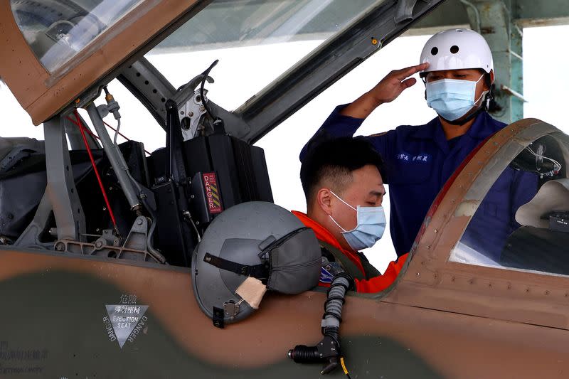 Chiang Chung-hao, 34, the lead singer of Taiwan's Air Force "Tiger Band" gets ready for flight check at Chihhang Air Base in Taitung