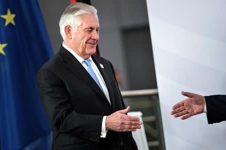 US Secretary of State Rex Tillerson is greeted as he arrives at the opening session meeting of the G20 Foreign ministers at the World Conference Center February 16, 2017 in Bonn, western Germany. REUTERS/Brendan Smialowski/Pool