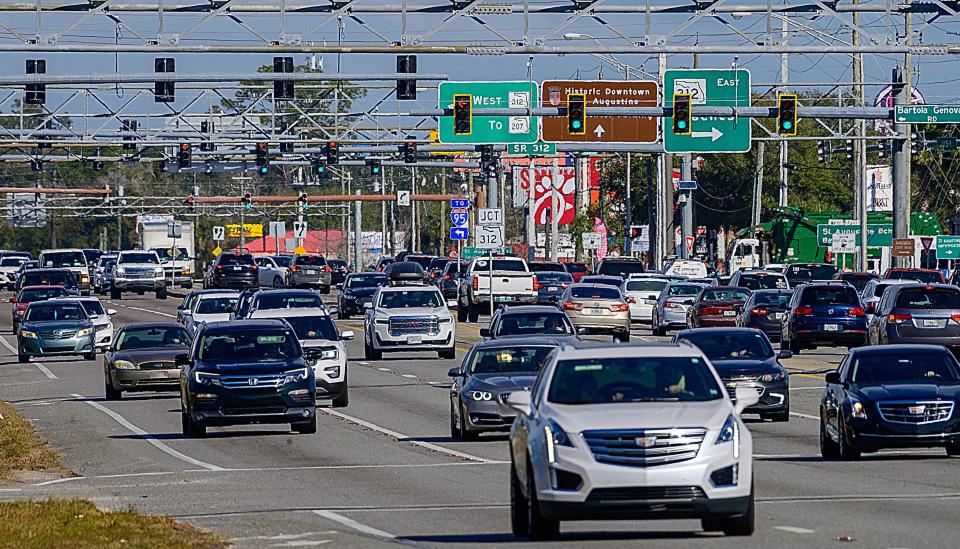 Vehicles travel on U.S. 1, south of St. Augustine, on Wednesday, Feb. 2, 2022. The St. Johns County Commission will discuss asking county voters to approve a sales-tax increase to help fund infrastructure improvements, including roads, in the November general election.