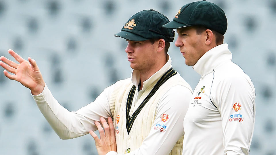 Steve Smith and Tim Paine are pictured in conversation during Australia's second Test against Pakistan.