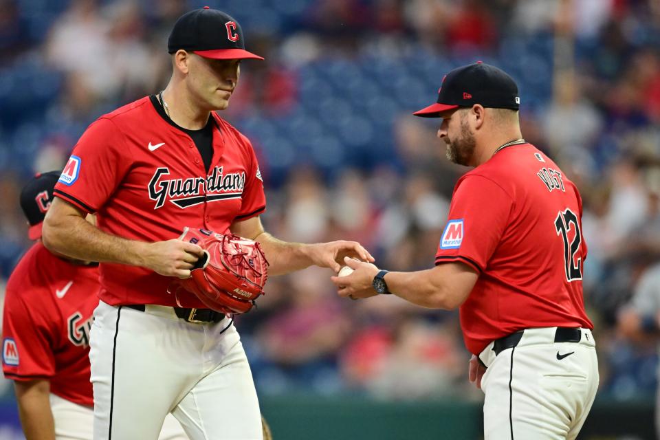 Sep 16, 2024; Cleveland, Ohio, USA; Cleveland Guardians manager Stephen Vogt (12) relieves starting pitcher Matthew Boyd (16) during the third inning against the Minnesota Twins at Progressive Field. Mandatory Credit: Ken Blaze-Imagn Images