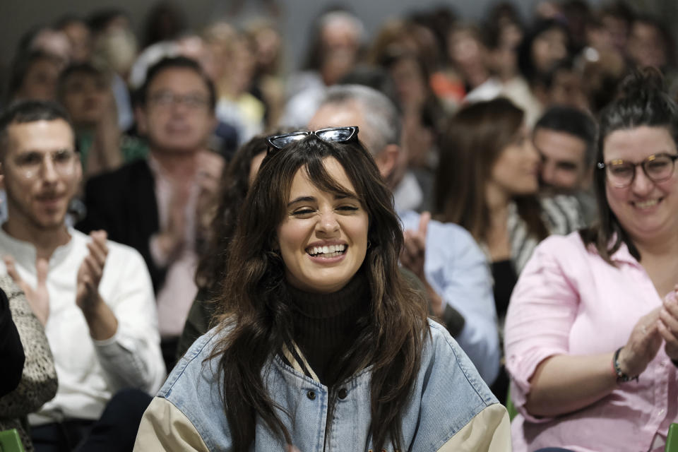 Cuban-born American singer and songwriter Camila Cabello smiles during an event to present her grandmother's book in Malaga, Spain, Thursday, March 23, 2023. When she's not singing or dancing, Cabello likes to support members of her family, such as grandmother Mercedes Rodriguez, who has recently published her debut novel in Spanish titled "Los boleros que he vivido". (AP Photo/Gregorio Marrero)