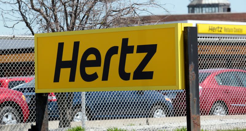 FILE PHOTO: A Hertz rental car sign is placed outside a rental lot near Detroit Metropolitan airport in Romulus