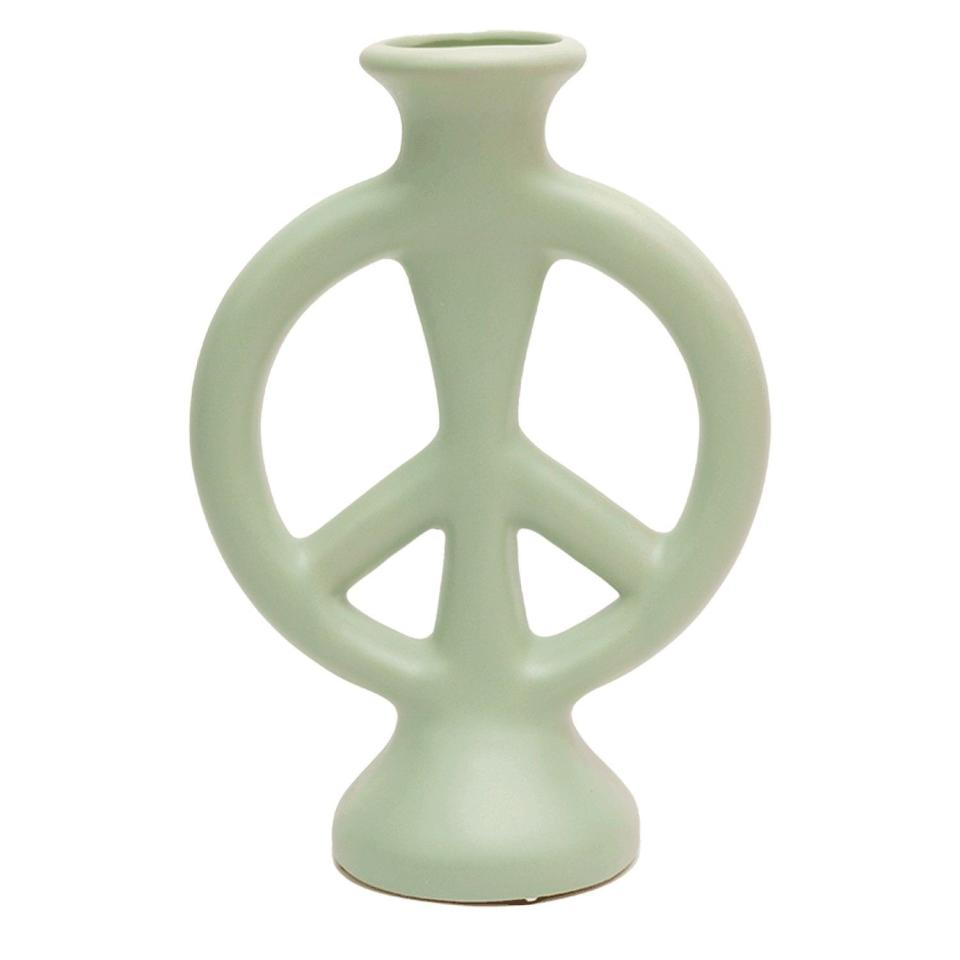 <p><a href="https://www.jungalow.com/collections/all-room-decor/products/peace-vase-by-justina-blakeney" rel="nofollow noopener" target="_blank" data-ylk="slk:Shop Now;elm:context_link;itc:0;sec:content-canvas" class="link ">Shop Now</a></p><p>Peace Vase by Justina Blakeney</p><p>jungalow.com</p><p>$25.00</p>