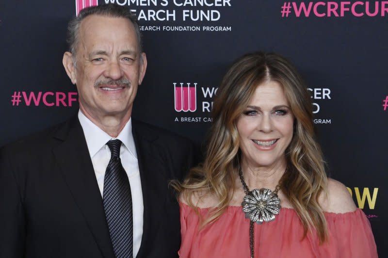 Tom Hanks, seen with wife Rita Wilson, narrates "The Americas" on NBC. File Photo by Jim Ruymen/UPI