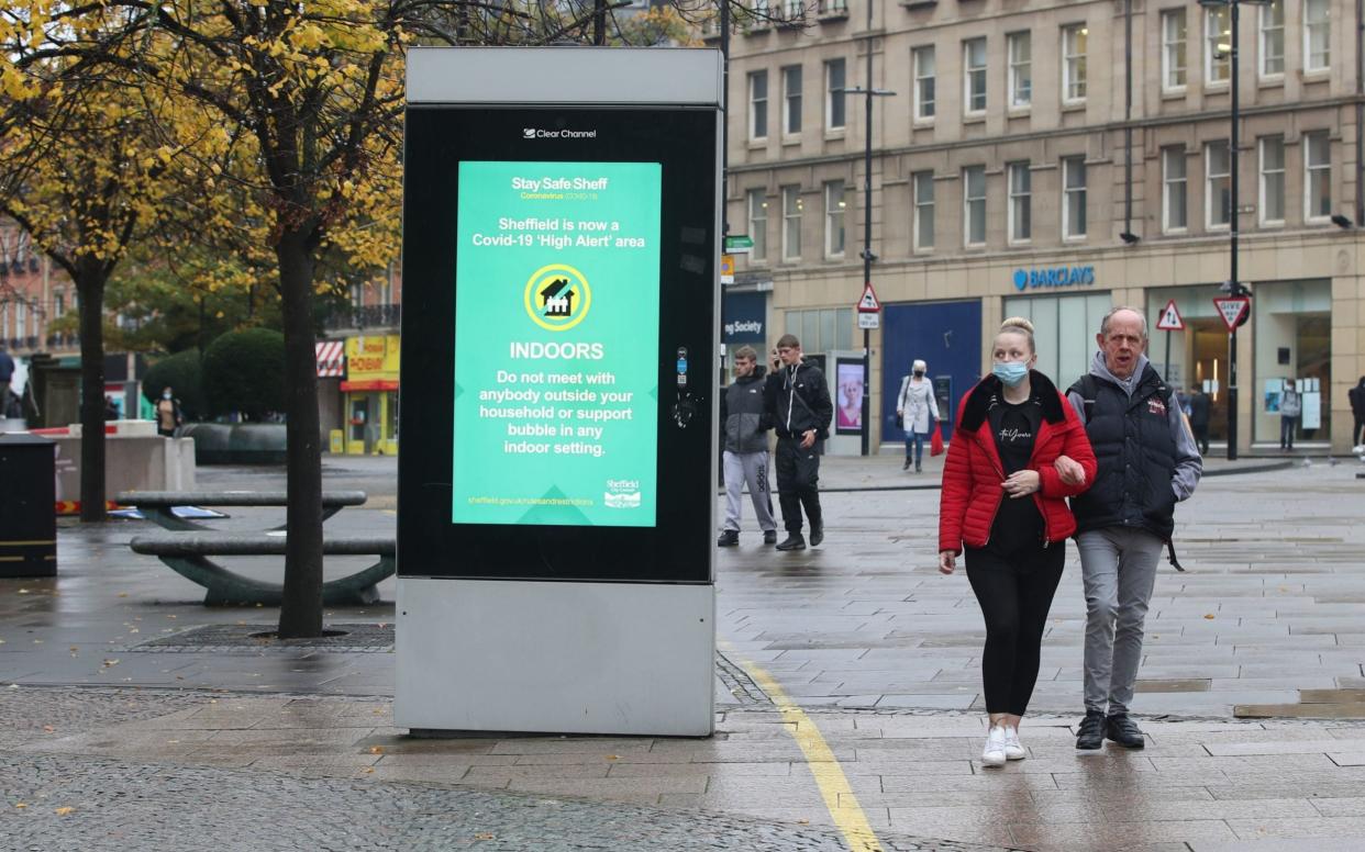 A coronavirus advice sign in Sheffield, as South Yorkshire is placed into Tier 3 -  Danny Lawson/PA