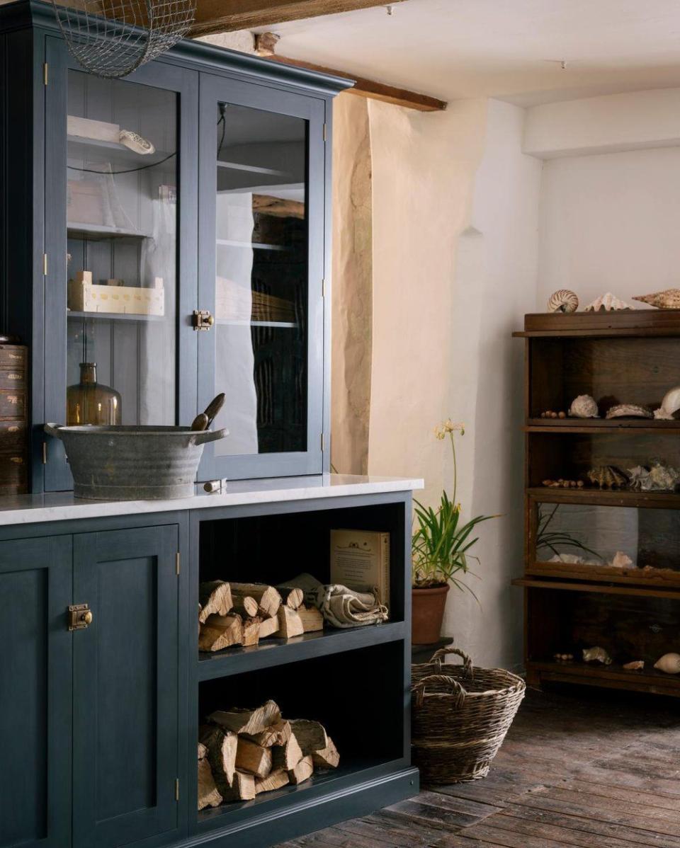 <p>Your kitchen will benefit from some foraged accents like logs, dried herbs, interesting shells from a beach walk, or some wildflowers from a country stroll. Alway keep your eye out for nature's offerings. </p><p>Pictured: <a href="https://www.devolkitchens.co.uk/kitchens/shaker-kitchen/cotes-shaker-utility-room" rel="nofollow noopener" target="_blank" data-ylk="slk:Bespoke utility room by deVOL;elm:context_link;itc:0" class="link ">Bespoke utility room by deVOL</a></p>