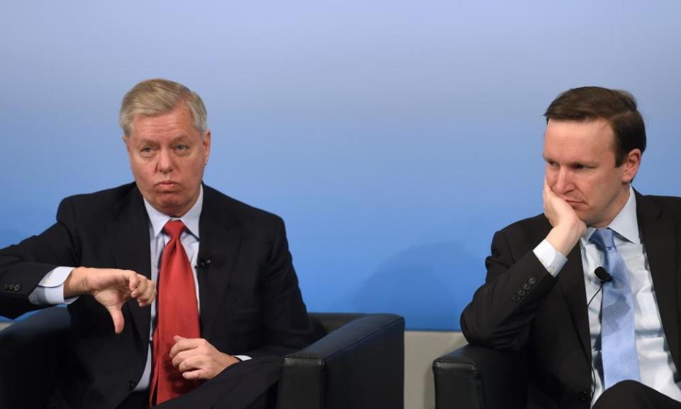 US Senators Lindsey Graham (L) and Chris Murphy (R) support a congressional investigation into the alleged hacking. 