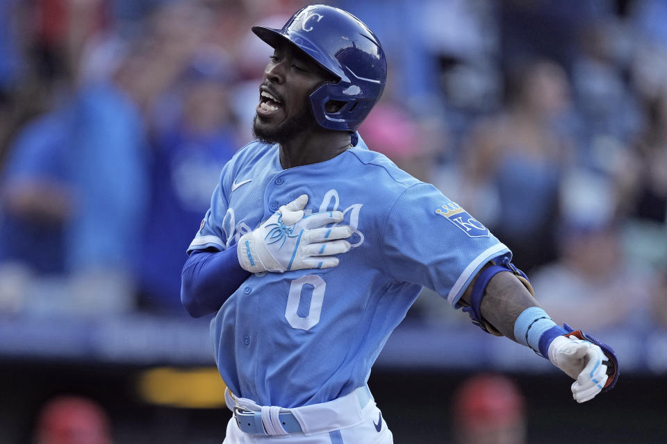 Kansas City Royals' Samad Taylor celebrates after hitting a single to drive in the winning run during the ninth inning of a baseball game against the Los Angeles Angels Saturday, June 17, 2023, in Kansas City, Mo. The Royals won 10-9. (AP Photo/Charlie Riedel)