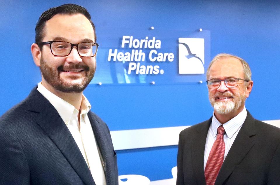 Dr. Stephen Keen, left, will become CEO of Florida Health Care Plans on Jan. 1, 2024. He is seen here with outgoing CEO David Schandel, who is retiring, at the health maintenance organization's headquarters at 2450 Mason Ave. in Daytona Beach on Monday, Dec. 11, 2023. Schandel has been part of FHCP's leadership team since 1994 in multiple roles including chief financial officer and the last four as CEO.