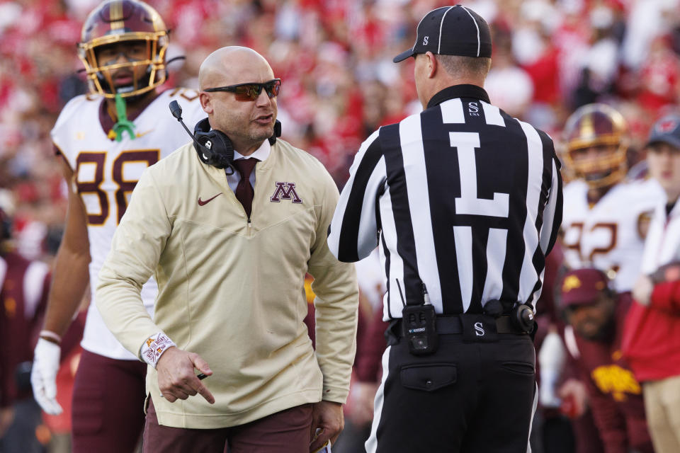 Nov 26, 2022; Madison, Wisconsin, USA; Minnesota Golden Gophers head coach P.J. Fleck argues with an official during the second quarter against the Wisconsin Badgers at Camp Randall Stadium. Mandatory Credit: Jeff Hanisch-USA TODAY Sports