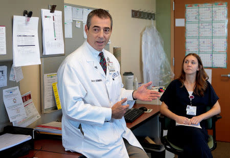 Dr. David Steinberg, Chief of Staff, Saint Joseph Mercy Health System chats with staff at Saint Joseph Mercy hospital in Ypsilanti, Michigan, U.S., August 23, 2017. Picture taken August 23, 2017. REUTERS/Rebecca Cook