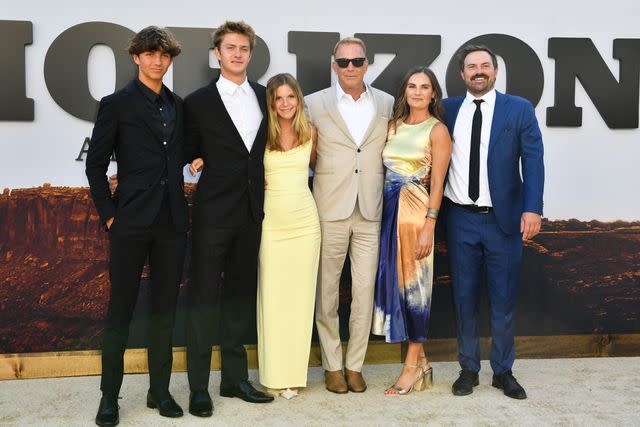 <p>VALERIE MACON/AFP via Getty</p> Hayes Logan Costner (left), Cayden Wyatt Costner, Grace Avery Costner, Kevin Costner, Annie Costner and Joe Costner