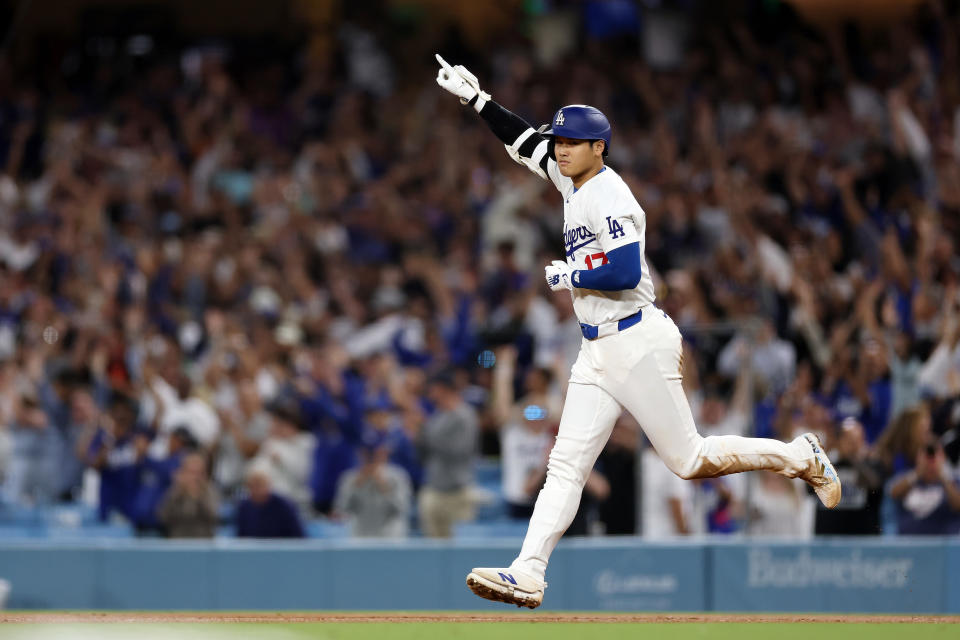 LOS ANGELES, CALIFORNIA - AUGUST 23: Shohei Ohtani #17 of the Los Angeles Dodgers celebrates his walk-off grand slam homerun, his 40th homerun of the season, against the Tampa Bay Rays at Dodger Stadium on August 23, 2024 in Los Angeles, California. (Photo by Katelyn Mulcahy/Getty Images)