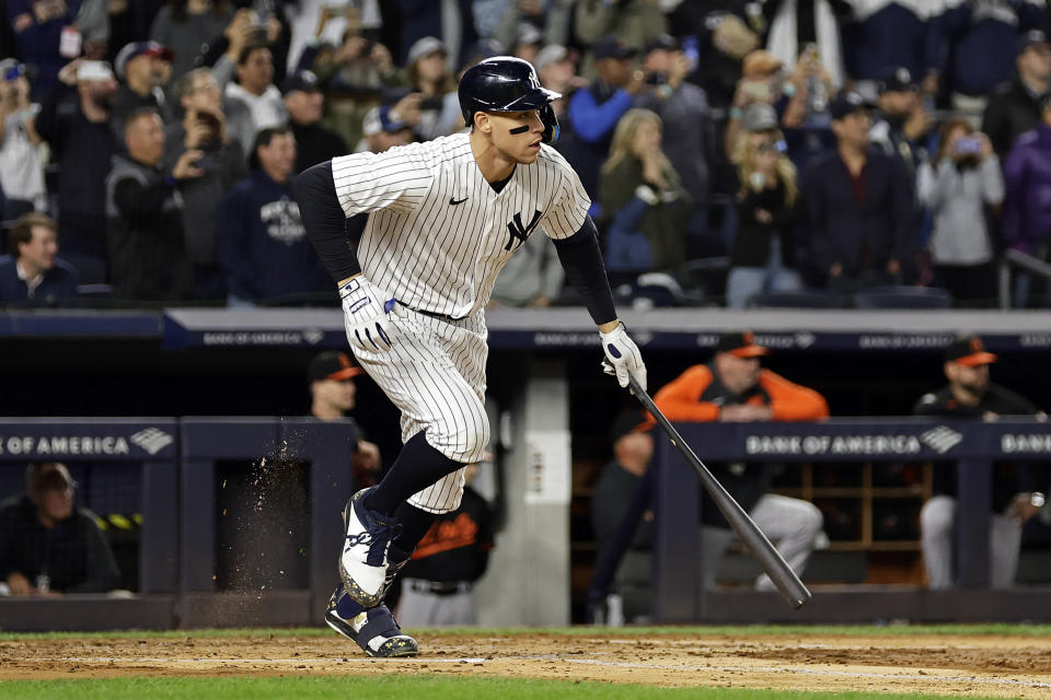 New York Yankees' Aaron Judge watches his single during the third inning of the team's baseball game against the Baltimore Orioles on Friday, Sept. 30, 2022, in New York. (AP Photo/Adam Hunger)