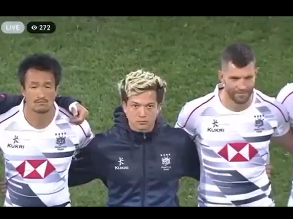 Screengrab from the video shows Hong Kong team’s rugby players standing in line while protest anthem plays in South Korea stadium  (Screengrab/ @krislc)