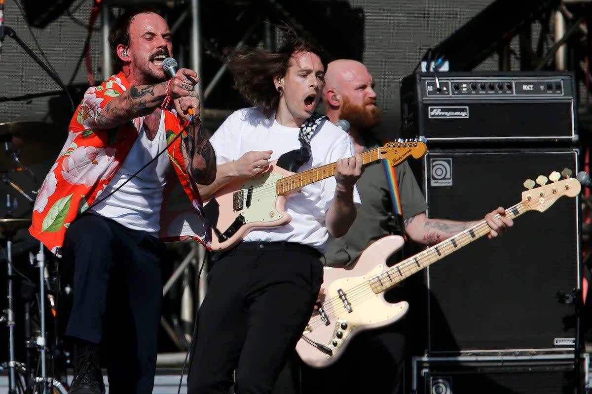 Talbot, Kiernan and Devonshire of Idles perform during day one of Lollapalooza Chile 2022 (Getty)