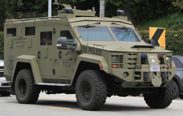 <p>HIGHFIVE/Bauer-Griffin/GC Images</p> A law enforcement vehicle outside Sean Combs' Beverly Hills estate