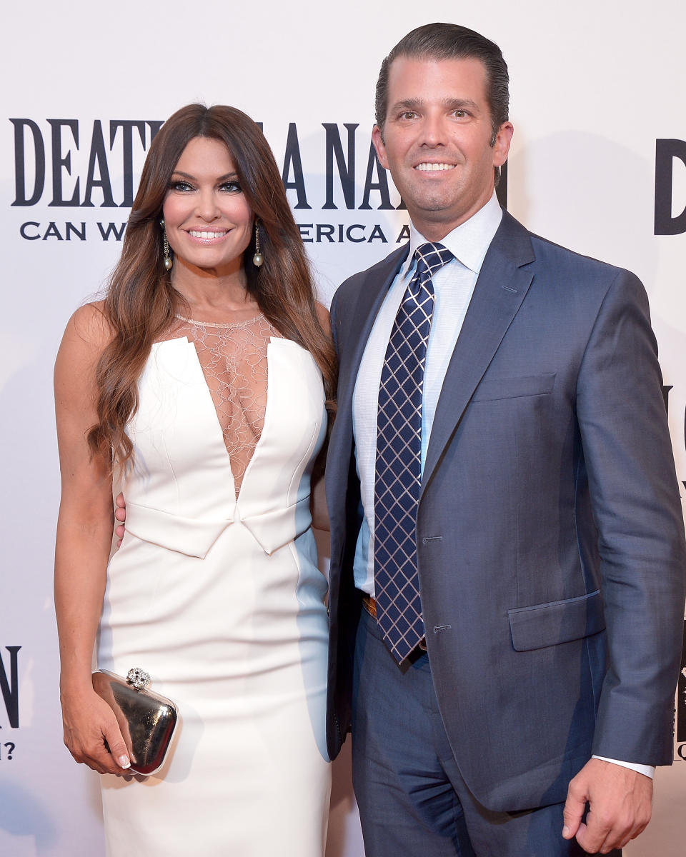 Kimberly Guilfoyle (pictured with boyfriend Donald Trump Jr. in August) hit the beach for her holiday greeting. (Photo: Shannon Finney/Getty Images)