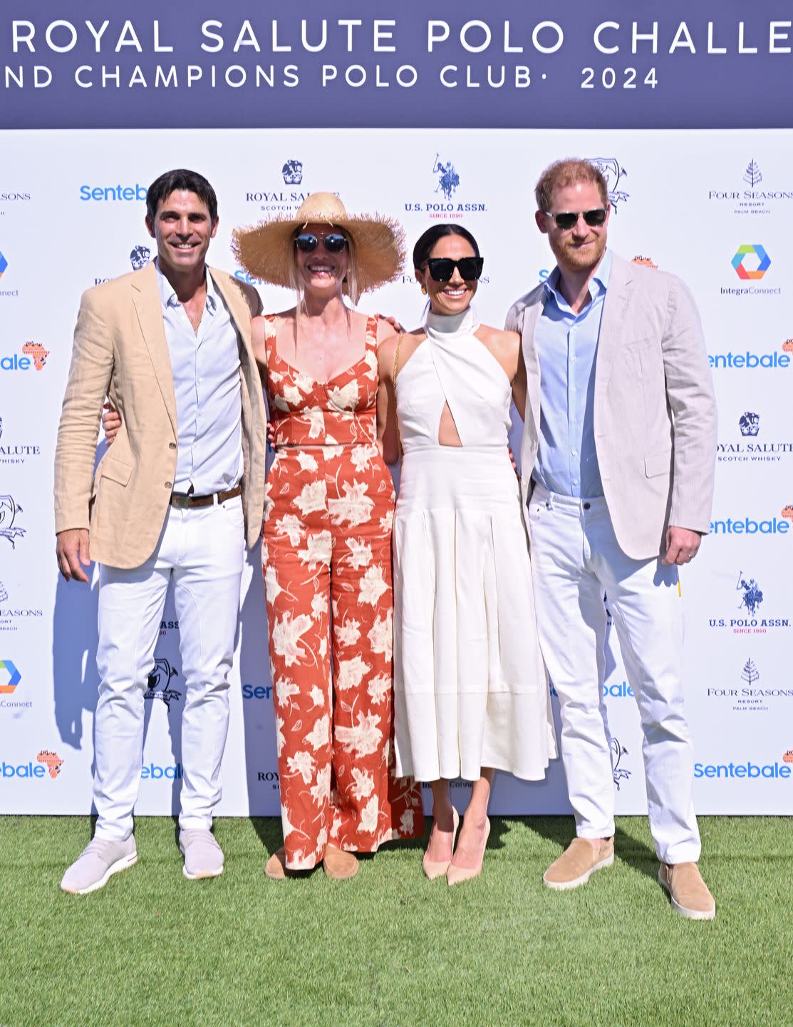 wellington, florida april 12 nacho figueras, delfina blaquier, meghan, duchess of sussex and prince harry, duke of sussex attend the royal salute polo challenge benefitting sentebale at grand champions polo club on april 12, 2024 in wellington, florida the annual polo cup has been running since 2010, and to date has raised over £114 million to support sentebales work with children and young people affected by poverty, inequality and hivaids in southern africa photo by jason koernergetty images for sentebale