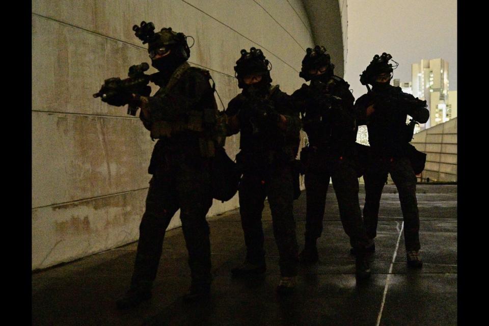 Operators from SAF's Special Operations Task Force preparing to storm the room during a counter-terrorism exercise conducted at The Star Vista. (PHOTO: Singapore Armed Forces)