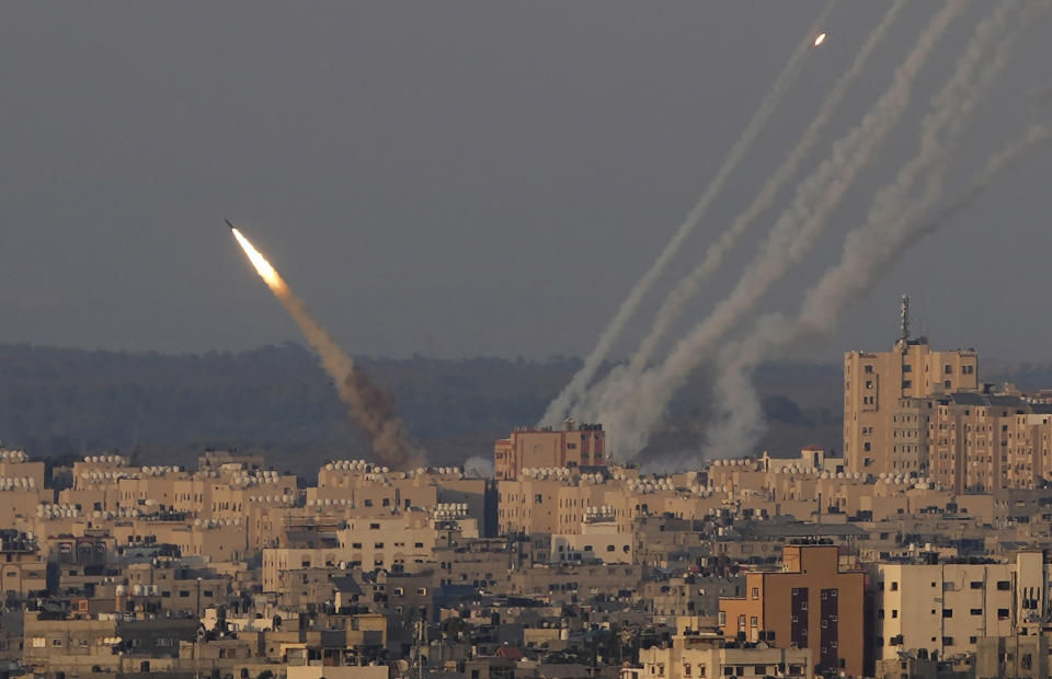 FILE - Rockets are launched from the Gaza Strip towards Israel, in Gaza City, Sunday, Aug. 7, 2022. (AP Photo/Hatem Moussa, File)