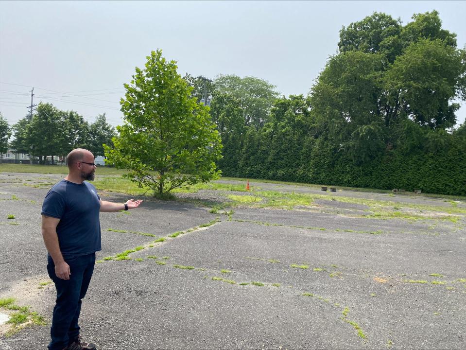 Mayor Keith Cafferty looking at the empty lot that used to be Welsh Farms, which now serves as the entrance to the disc golf course next to Veterans Memorial Park on Old Corlies Avenue in Neptune.