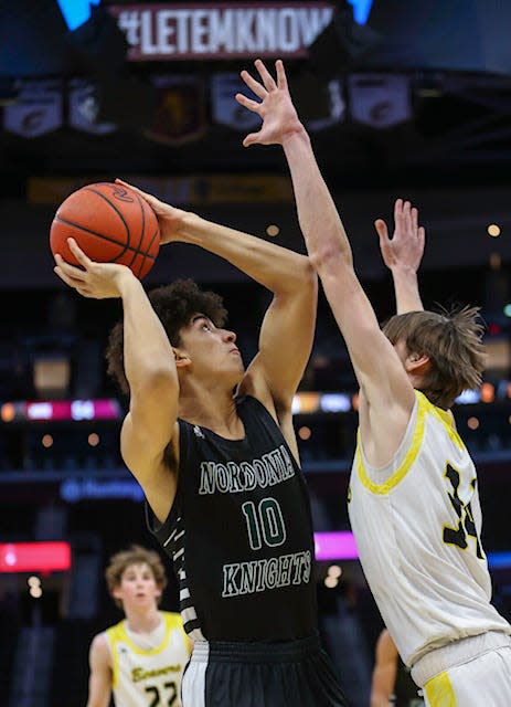 Nordonia forward Isaac Cherry puts up a shot during the the Knights' 63-62 win over Painesville Riverside Wednesday at Rocket Mortgage FieldHouse in Cleveland.