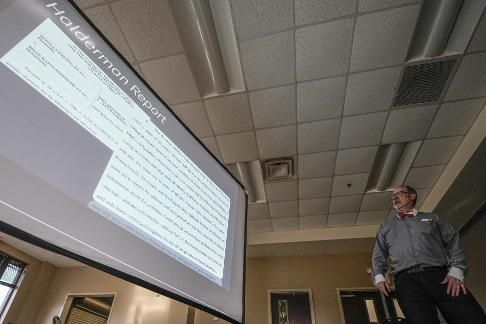 Douglas G. Frank speaks to a group of people about the Georgia election process, Sunday, March 24, 2024, in Rome, Ga. Frank is among those urging people to file voter challenges using a software tool called EagleAI to get potentially ineligible voters removed from the registration rolls. (AP Photo/Mike Stewart)