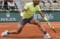 Spain's Rafael Nadal plays a backhand return Germany's Yannick Hanfmann during their men's singles first round match on day two of The Roland Garros 2019 French Open tennis tournament in Paris on May 27, 2019. (Photo by Thomas Samson/AFP/Getty Images)