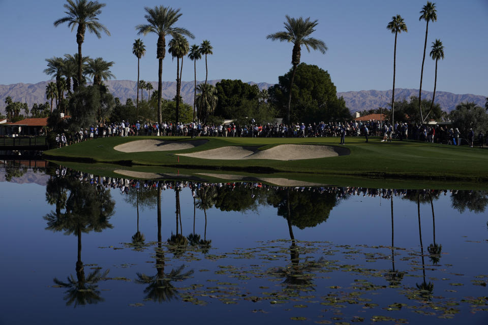 Phil Mickelson puts on the fourth green during the first round of the American Express golf tournament at La Quinta Country Club Thursday, Jan. 20, 2022, in La Quinta, Calif. (AP Photo/Marcio Jose Sanchez)