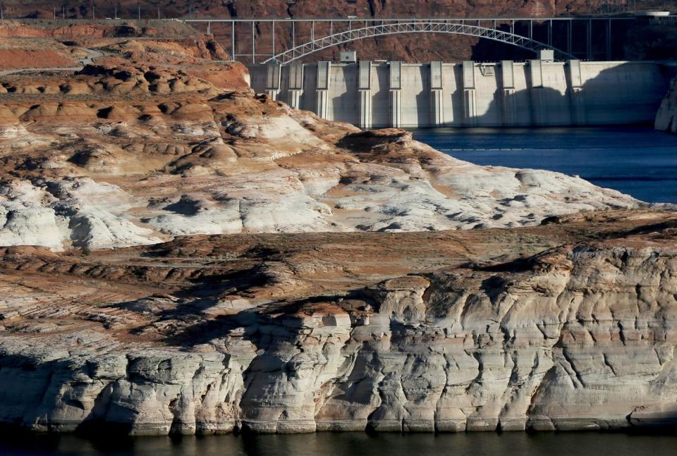 Water flows down the Colorado River at the Glen Canyon Dam near Page, Ariz.