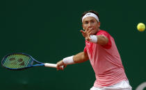 Casper Ruud of Norway returns the ball to Andrey Rublev of Russia during their semifinal match of the Monte Carlo Tennis Masters tournament in Monaco, Saturday, April 17, 2021. (AP Photo/Jean-Francois Badias)