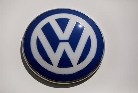 FILE PHOTO: The logo of Volkswagen carmaker is seen at the entrance of a showroom in Nice