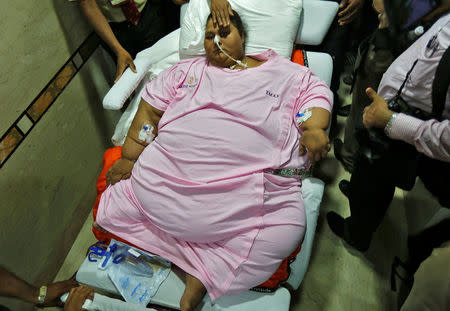 Eman Ahmed, an Egyptian woman who underwent weight loss surgery, is carried on a stretcher as she leaves a hospital in Mumbai, India May 4, 2017. REUTERS/Shailesh Andrade